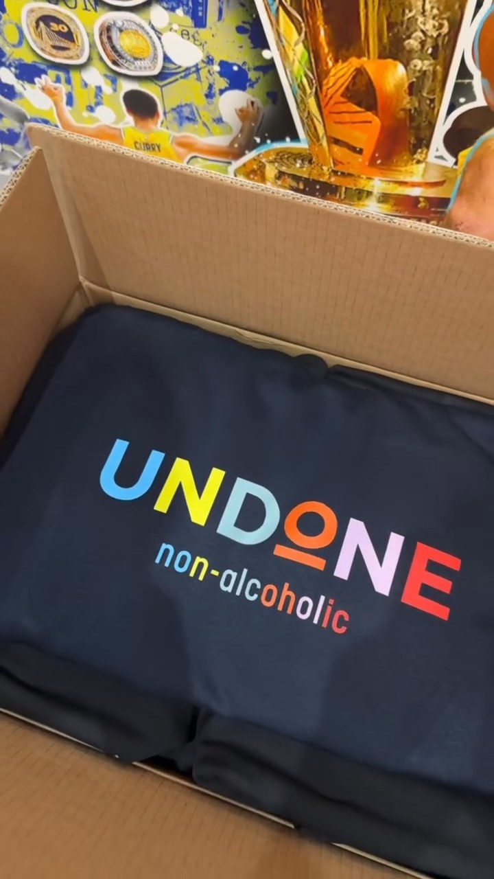 Printed branded hoodies packed in a shipping box at Urban Customz