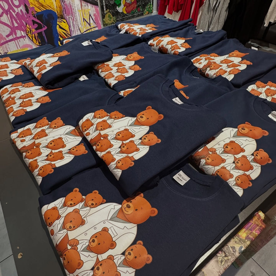 Stack of custom printed crewnecks for a team